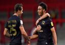 Milton Keynes Dons’ Jay Bird (right) celebrates scoring his side's second goal of the game during the EFL Trophy match at the Lamex Stadium, Stevenage.