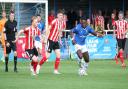 New Wealdstone signing Ira Jackson on the ball against Altrincham