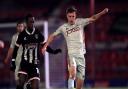 Grimsby Town's Ira Jackson (left) and Bradford City's Elliot Watt battle for the ball during the Sky Bet League Two match at Blundell Park, Grimsby.