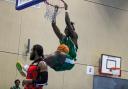 Jacob Stanuel-Taitte scores with a dunk for Westminster Warriors