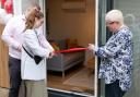 Andrea and Costel who came up with idea for The Cabin, cutting the ribbon with hospice chief executive Sophie Andrews