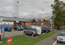 The side view of the Wembley Centre for Health and Care car park and a  side view of the old Wembley Hospital building to be sold