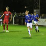 Matt Buse of Wealdstone celebrates scoring against Grimsby Town