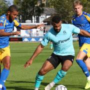 Dan Wishart of Wealdstone on the ball at King's Lynn Town