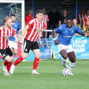 New Wealdstone signing Ira Jackson on the ball against Altrincham