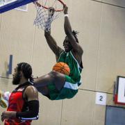 Jacob Stanuel-Taitte scores with a dunk for Westminster Warriors