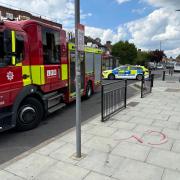 Emergency services in Church Lane, Kingsbury, after a fire above the As Good As New laundrette