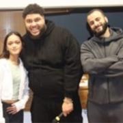 Zuhair Hassan award-winner Rowelyn-Jane Karris, Big Zuu and Hyder Abdullah at St Augustine's High School