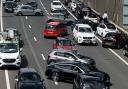 Police have arrested a man after a huge crash on the M1 which has caused severe delays and chaos