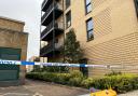 A police cordon is still in place next to Queensbury Morrisons