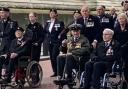 Naval veteran Kenneth MacNaughton talking part in the Cenotaph march past