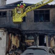 The charred wreck of a Wembley house after a lithium battery failed while it was charging