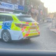 A police car at Willesden after a crash