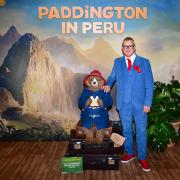 Hugh Bonneville meets Madame Tussauds' latest figure on the red carpet at the Paddington in Peru premiere.