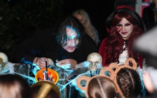 Jonathan Ross outside his house in north London with trick-or-treaters (James Manning/PA)